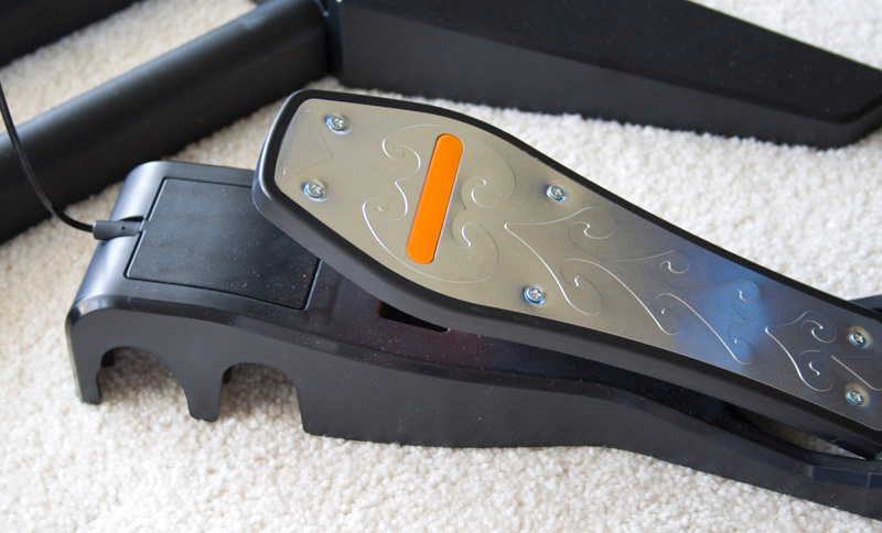 Illustration for article titled Rock Band 2 Wireless Guitar and Drums Hardware Review